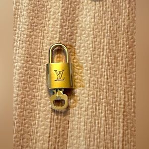 #308 Louis Vuitton Lock & Key gold beautiful classy
